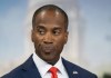 John James Plays The Race Card